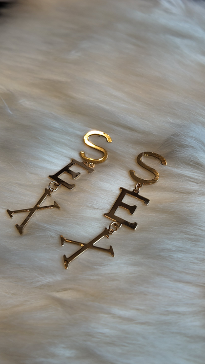 S E X earrings